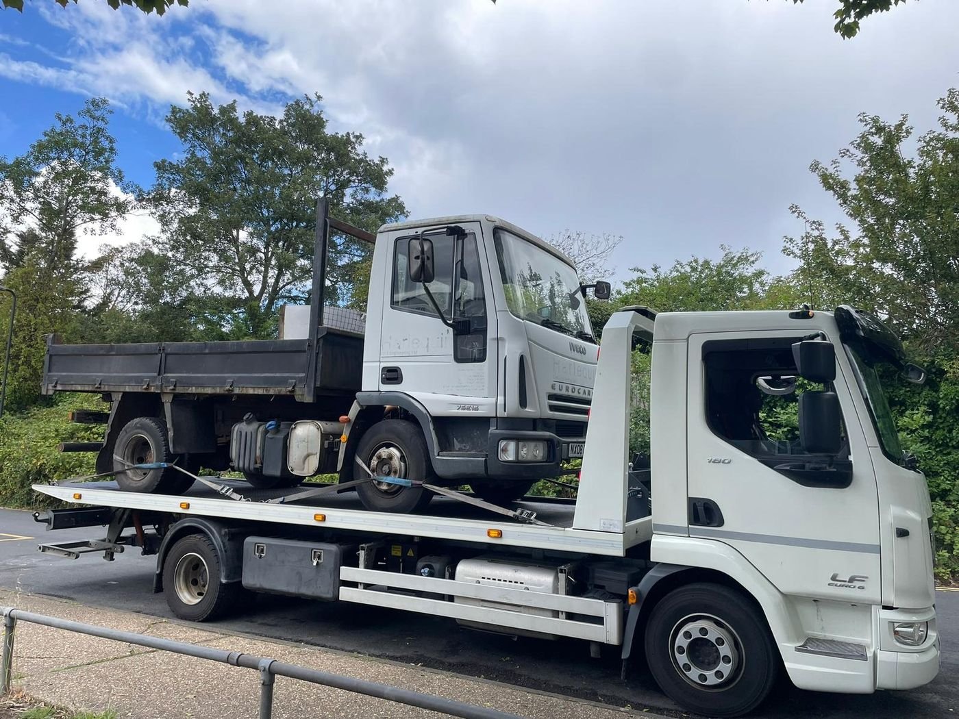 Car secured on a Z&Z recovery truck for transport