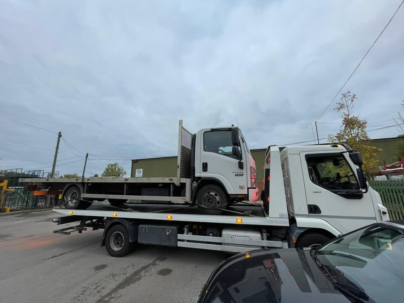 Z&Z Auto Recovery flatbed truck on the job